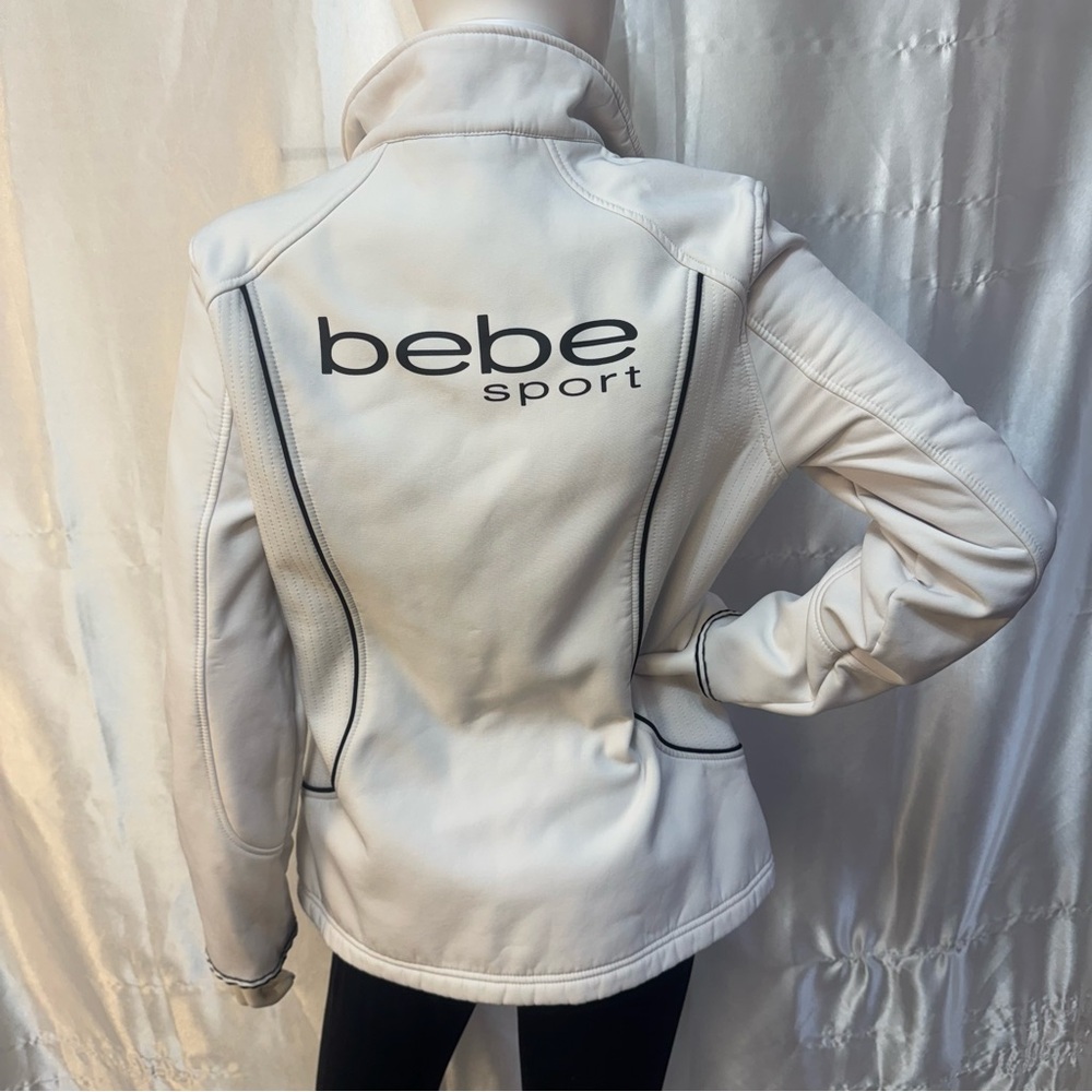 bebe Sport Women's White Soft Shell Jacket with Bold Black Logo Details